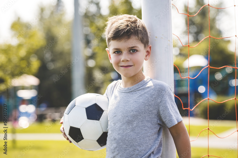 Nice Football player boy playing soccer outside Nice Football player boy playing soccer outside