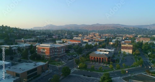 Sweeping drone shot passing over city in the mountains. Klamath Falls, Oregon.