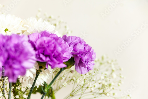 Still life of purple and white flowers
