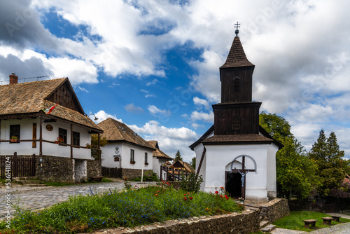 view of the historic village center and old church in Holloko