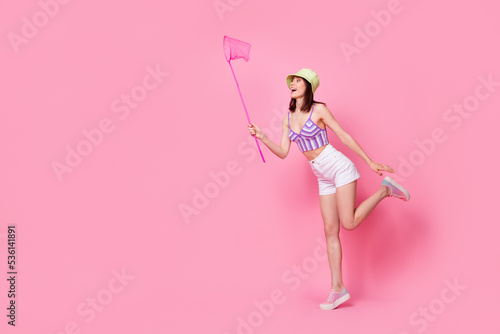 Photography Full body photo of energetic young lady active leisure catch butterfly wear styl