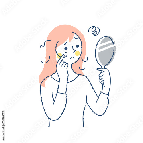 髪の悩み　手鏡で傷んだ髪の毛を見てる女性