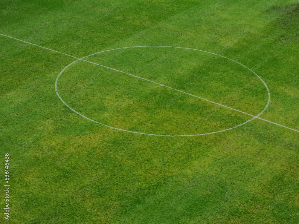 center of a grass soccer field aerial view. center of a grass soccer field aerial view.