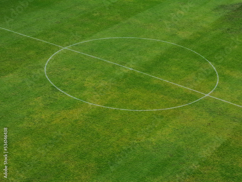 center of a grass soccer field aerial view.