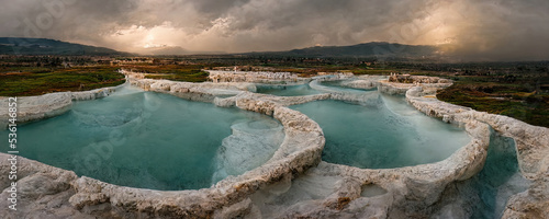 Fantasy landscape. Mineral thermal springs. Natural travertine pool with hot sea water, beautiful scenery. 3D illustration.