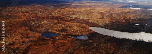 Landscape riverbed and land relief. View from above. Aerial photography. Putorano Plateau. Peninsula Taimyr photo