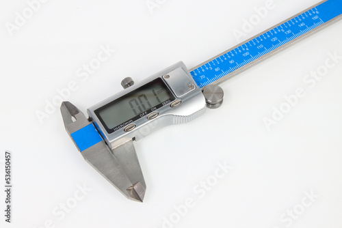 engineering digital caliper on white background photo