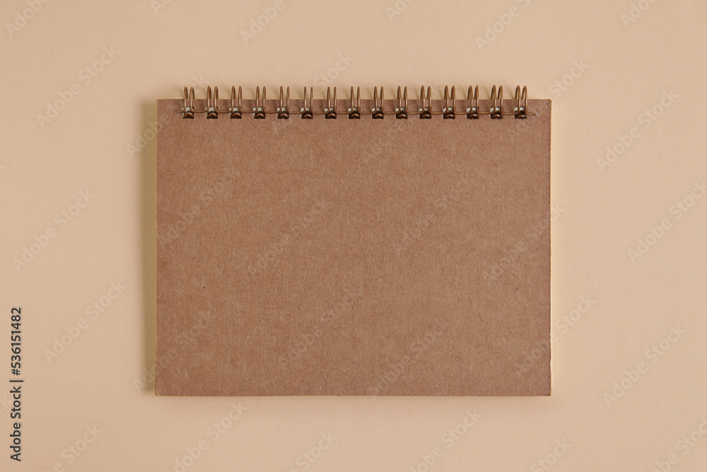 Empty blank sketchbook mock up with brown craft paper, notebook, Top view. Flat lay. Empty blank sketchbook mock up with brown craft paper, notebook, Top view. Flat lay.