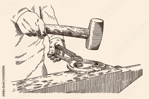 A blacksmith with a hammer and tongs in his hands forges a horseshoe on an anvil. Ancient engraving. USSR. 1932