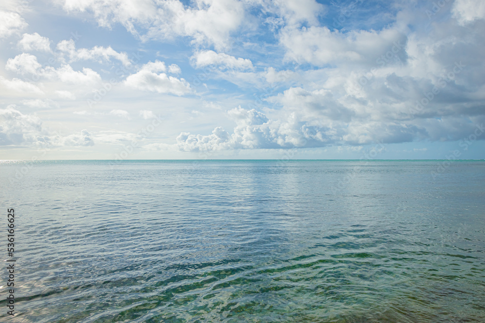 Obraz premium No man's Land Tinidad and Tobago calm sea beach clouds sky island seascape tropical travel destination