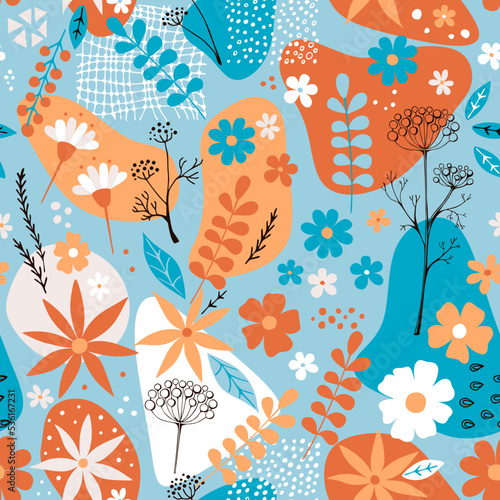 Floral ornament on colorful stains. Seamless pattern with hand drawn flowers....
