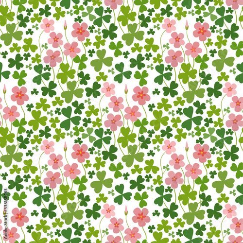 Flower bed with oxalises. Bright flower meadow. Floral seamless pattern.