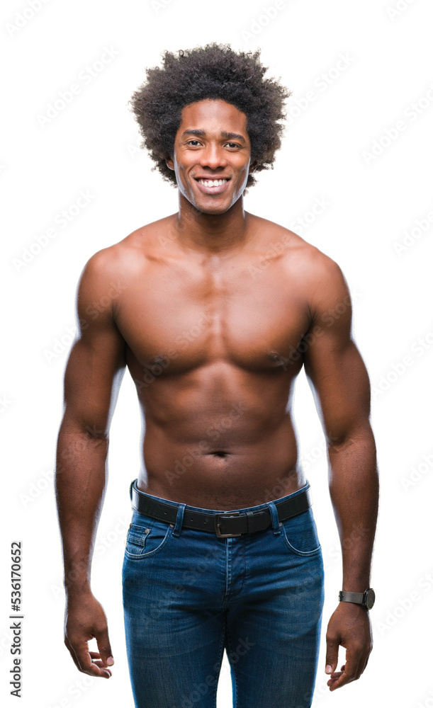 Fototapeta premium Afro american shirtless man showing nude body over isolated background with a happy and cool smile on face. Lucky person.