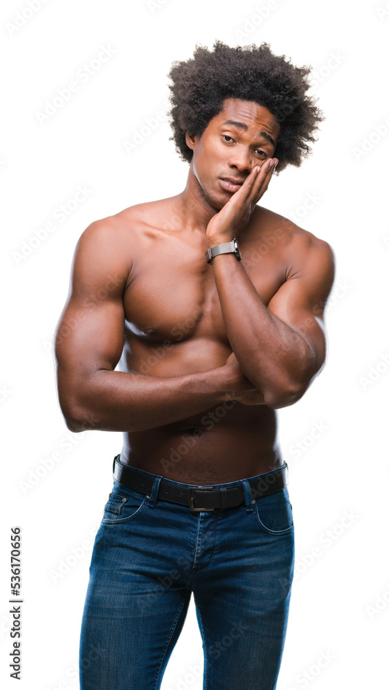 Afro american shirtless man showing nude body over isolated background thinking looking tired and bored with depression problems with crossed arms. Afro american shirtless man showing nude body over isolated background thinking looking tired and bored with depression problems with crossed arms.