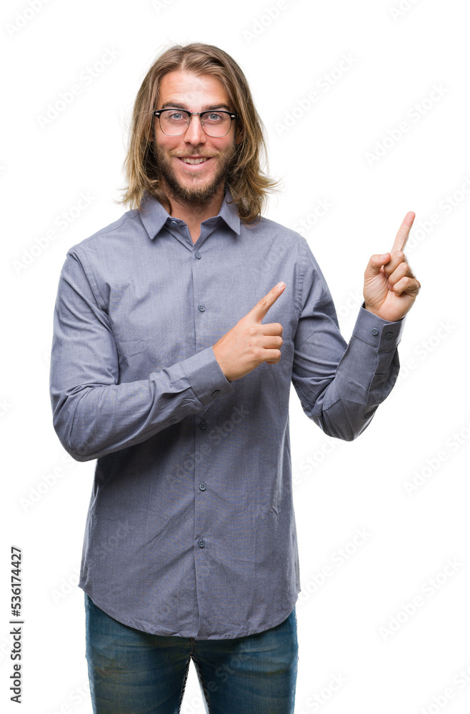 Young handsome business man with long hair over isolated background smiling and looking at the camera pointing with two hands and fingers to the side. Young handsome business man with long hair over isolated background smiling and looking at the camera pointing with two hands and fingers to the side.