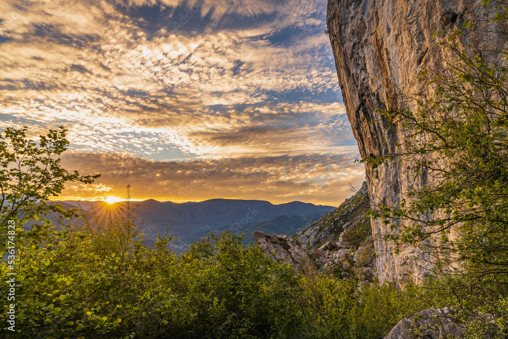 Fototapeta premium Sunset in the climbing area called Aguja de Sobia, in Pena Sobia in Teberga, Teverga, Asturias.