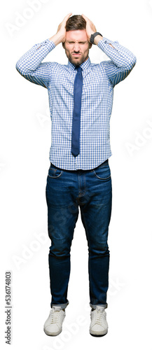 Fotografie Handsome business man wearing tie suffering from headache desperate and stressed because pain and migraine