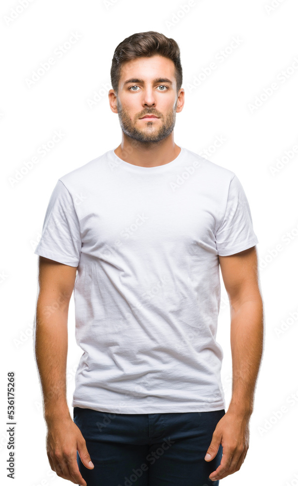 Young handsome man over isolated background with serious expression on face. Simple and natural looking at the camera. Young handsome man over isolated background with serious expression on face. Simple and natural looking at the camera.