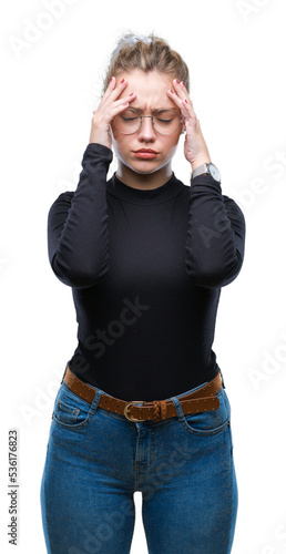 Obraz na plátně Young blonde woman wearing glasses over isolated background suffering from headache desperate and stressed because pain and migraine
