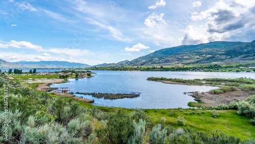 View of Osoyoos Lake with its surrounding vineyards on the mountain slopes in the Okanagen Valley of British Columbia, Canada