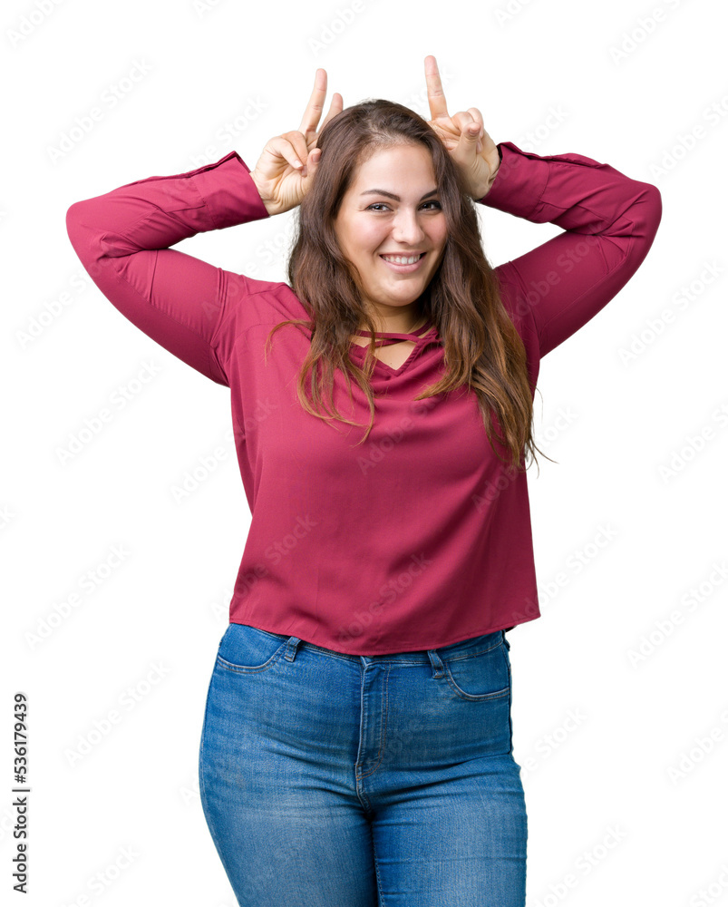 Beautiful plus size young woman over isolated background Posing funny and crazy with fingers on head as bunny ears, smiling cheerful Beautiful plus size young woman over isolated background Posing funny and crazy with fingers on head as bunny ears, smiling cheerful