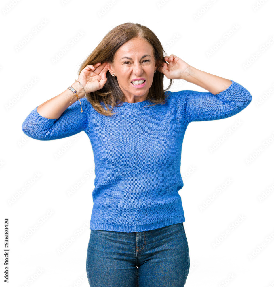 Middle age beautiful woman wearing winter sweater over isolated background Smiling pulling ears with fingers, funny gesture. Audition problem Middle age beautiful woman wearing winter sweater over isolated background Smiling pulling ears with fingers, funny gesture. Audition problem