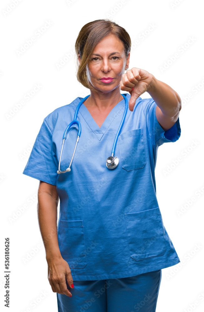 Middle age senior nurse doctor woman over isolated background looking unhappy and angry showing rejection and negative with thumbs down gesture. Bad expression. Middle age senior nurse doctor woman over isolated background looking unhappy and angry showing rejection and negative with thumbs down gesture. Bad expression.