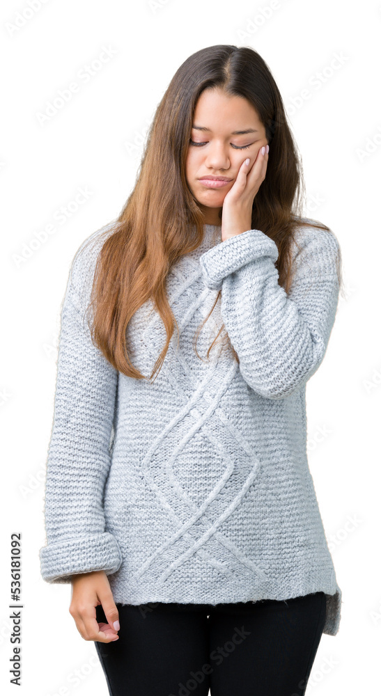 Young beautiful brunette woman wearing sweater over isolated background thinking looking tired and bored with depression problems with crossed arms. Young beautiful brunette woman wearing sweater over isolated background thinking looking tired and bored with depression problems with crossed arms.