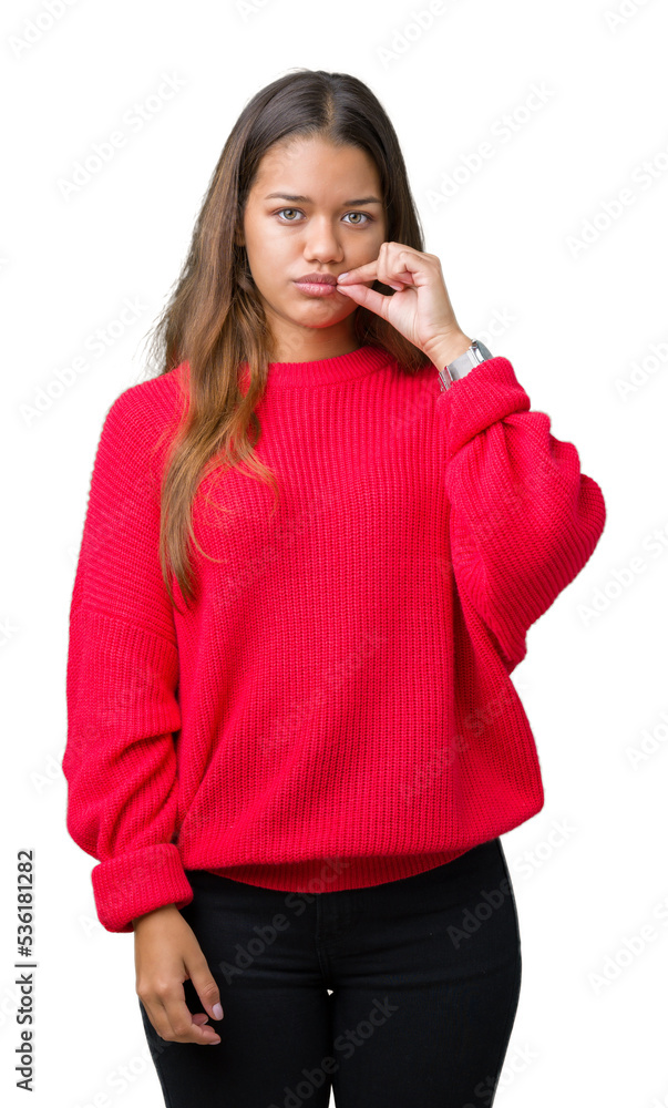 Young beautiful brunette woman wearing red winter sweater over isolated background mouth and lips shut as zip with fingers. Secret and silent, taboo talking Young beautiful brunette woman wearing red winter sweater over isolated background mouth and lips shut as zip with fingers. Secret and silent, taboo talking