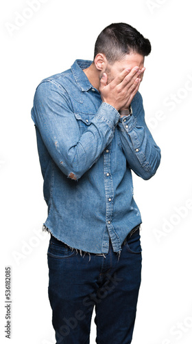 Young handsome man over isolated background with sad expression covering face with hands while crying. Depression concept. © Krakenimages.com