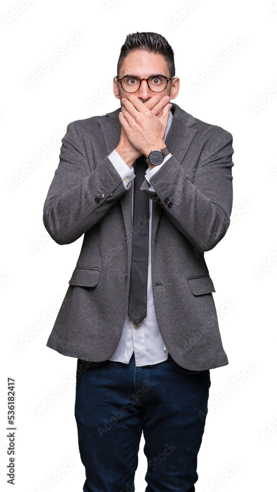 Young handsome business man over isolated background shocked covering mouth with hands for mistake. Secret concept. Young handsome business man over isolated background shocked covering mouth with hands for mistake. Secret concept.