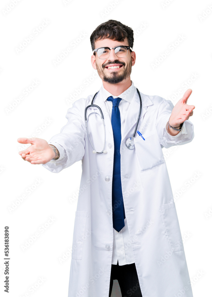 Young doctor man wearing hospital coat over isolated background looking at the camera smiling with open arms for hug. Cheerful expression embracing happiness. Young doctor man wearing hospital coat over isolated background looking at the camera smiling with open arms for hug. Cheerful expression embracing happiness.