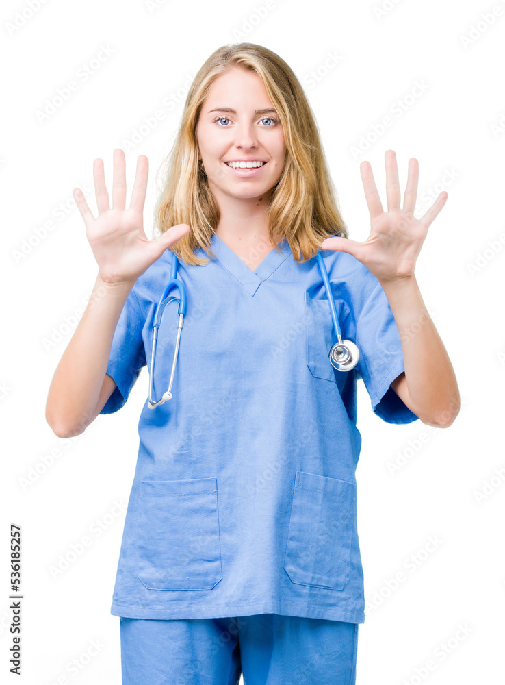 Beautiful young doctor woman wearing medical uniform over isolated background showing and pointing up with fingers number ten while smiling confident and happy. Beautiful young doctor woman wearing medical uniform over isolated background showing and pointing up with fingers number ten while smiling confident and happy.