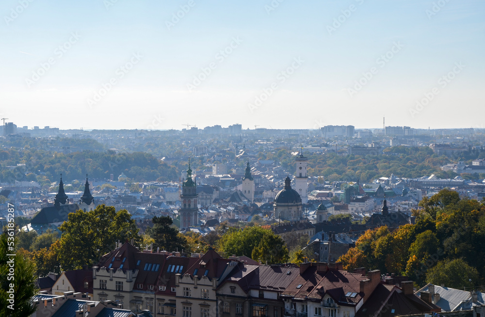 Aerial panoramic view of old quarters with a churches and cathedrals in historical city center in Lviv, Ukraine. 
