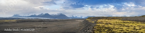 Iceland autumn tundra landscape near Haoldukvisl glacier  Iceland. Glacier tongue slides from the Vatnajokull icecap or Vatna Glacier near subglacial Esjufjoll volcano. Not far from Iceland Ring Road.