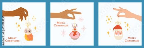 Woman hand with owl, deer and Santa. New Year toy and manicure. Christmas toy vector illustration