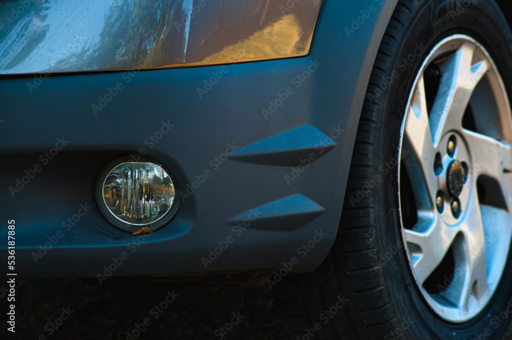 Alloy car wheel rim with break and tire close up view