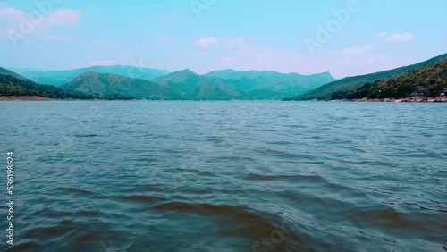 Aerial view of the prado dam where you can see a lot of water like the sea in tolima colombia - family vacations concept on water