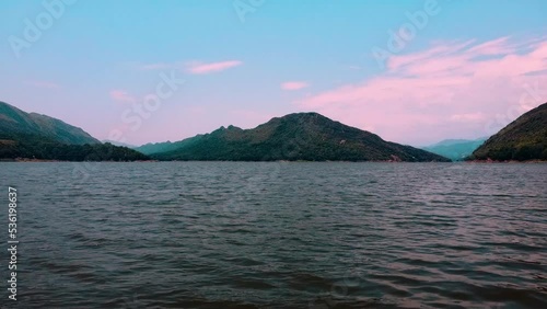 Aerial view of the prado dam side where you can see a lot of water as the sea in tolima colombia - family vacation concept on water