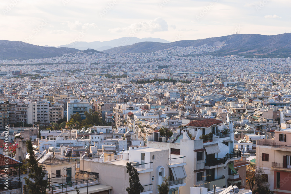 Athens, Attica, beautiful super-wide angle view of Athens, Greece, with Acropolis, Mount Lycabettus, mountains and scenery beyond the city, seen from Strefi Hill park in Exarcheia neighbourhood