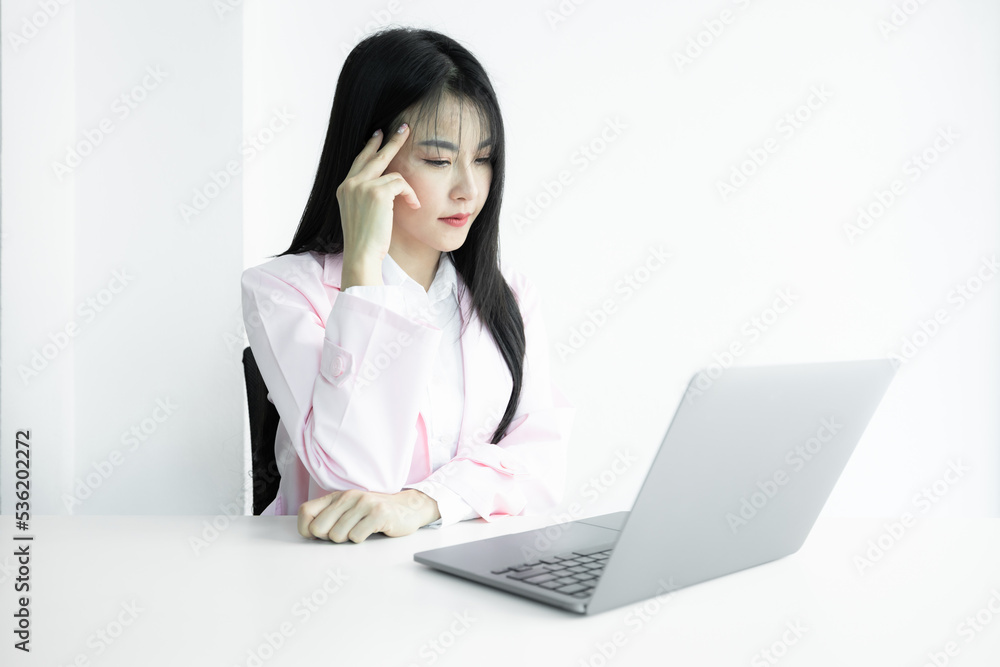 Asian woman doctor using computer laptop on white background, Asian woman doctor in pink coat with computer laptop, Medical and healthcare working diagnosing examination health. Asian woman doctor using computer laptop on white background, Asian woman doctor in pink coat with computer laptop, Medical and healthcare working diagnosing examination health.