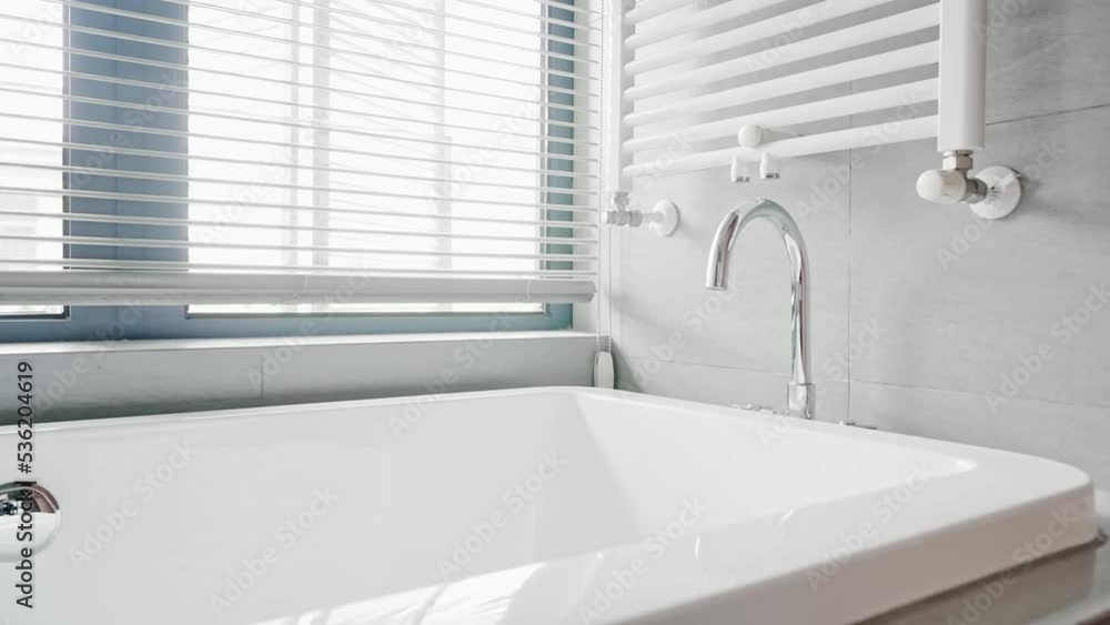 elegant big white bathtub in modern bathroom elegant big white bathtub in modern bathroom