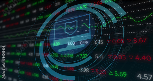 Image of scope scanning with computer icon over stock market on black background