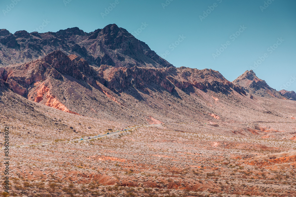 Fototapeta premium Cars on a road driving through Zion National Park