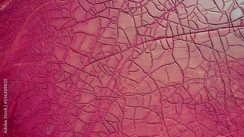 Pink dry land broken glass texture on the shores of Mars like copper mines of Rio Tinto Pink dry land broken glass texture on the shores of Mars like copper mines of Rio Tinto