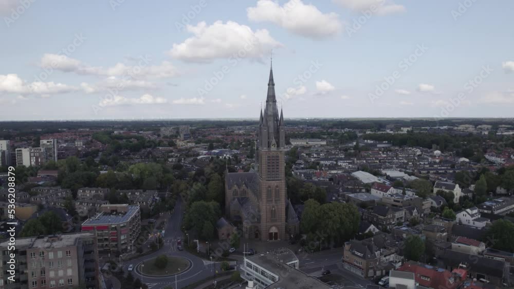 Drone Orbiting view Sint Vituskerk Church in Hilversum, the highest neo-Gothic church tower in the Netherlands Drone Orbiting view Sint Vituskerk Church in Hilversum, the highest neo-Gothic church tower in the Netherlands