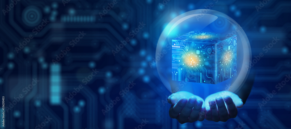 Businessman hand holding Cube technology with Abstract blue background ...