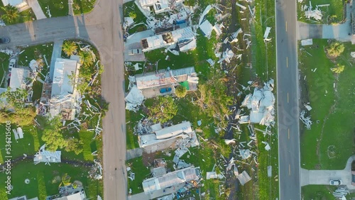Hurricane Ian destroyed homes in Florida residential area. Natural disaster and its consequences photo