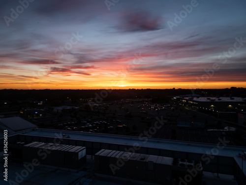 A sunset in Pontiac  Michigan facing west on a cloudy day taken from the Henry Ford parking structure