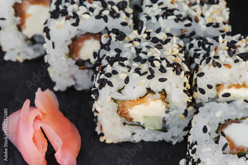 Japanese sushi roll philadelphia on black stone